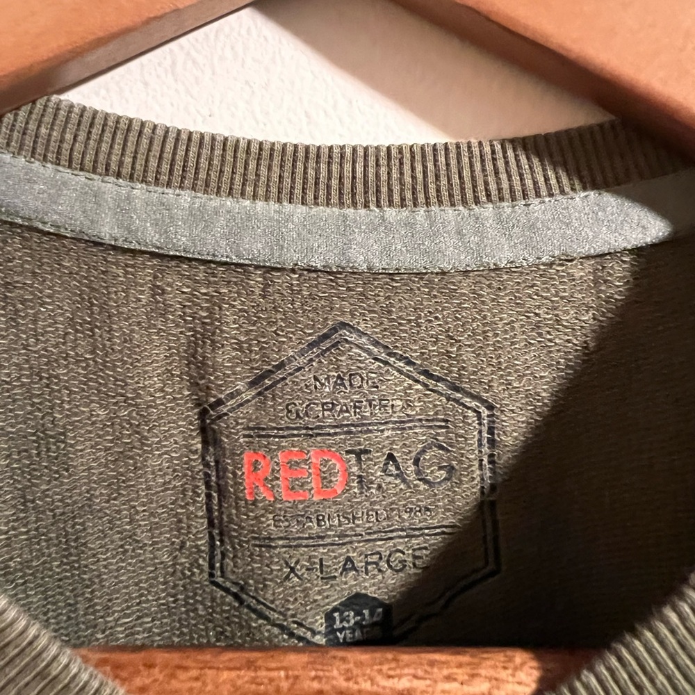 Unisex red tag sweatshirt